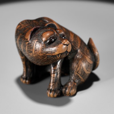 Lot 341 - SHIGEKAZU: A FINE WOOD NETSUKE OF A TIGER