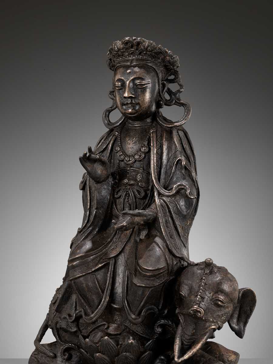 Lot 502 - A BRONZE FIGURE OF SAMANTABHADRA RIDING AN ELEPHANT, MING DYNASTY