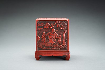 Lot 22 - A CINNABAR LACQUER ‘IMMORTALS AND BUDAI’ BOX AND COVER, QING