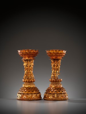 Lot 285 - A PAIR OF GILT-LACQUERED WOOD ALTAR EMBLEM STANDS, QING DYNASTY
