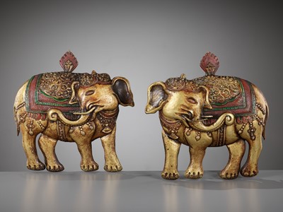 Lot 152 - A PAIR OF GILT AND POLYCHROME-DECORATED COPPER REPOUSSÉ PLAQUES DEPICTING ‘PRECIOUS ELEPHANTS’, HASTIRATNA, 17TH-18TH CENTURY