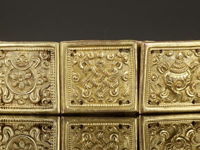 Lot 492 - A GROUP OF EIGHT ‘BAJIXIANG’ SQUARE ORNAMENTS, GILT-COPPER REPOUSSÉ, MID-QING DYNASTY