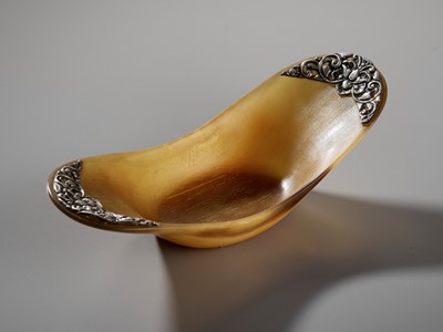 Lot 12 - A BUFFALO HORN AND SILVER LIBATION CUP, TIBET, 19TH CENTURY