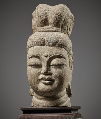 Lot 170 - A RARE SANDSTONE HEAD OF GUANYIN, SUI TO TANG DYNASTY