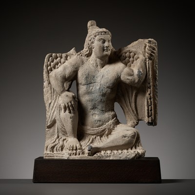 Lot 224 - A GRAY SCHIST FIGURE OF A WINGED ATLAS, ANCIENT REGION OF GANDHARA, 3RD - 4TH CENTURY