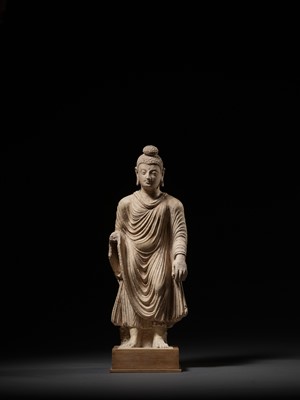 Lot 229 - A RARE AND IMPORTANT STUCCO FIGURE OF BUDDHA, ANCIENT REGION OF GANDHARA