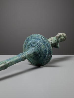 Lot 279 - A KHMER BRONZE FITTING WITH A FIGURE OF A FEMALE DEITY, ANGKOR PERIOD