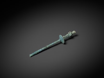 Lot 279 - A KHMER BRONZE FITTING WITH A FIGURE OF A FEMALE DEITY, ANGKOR PERIOD