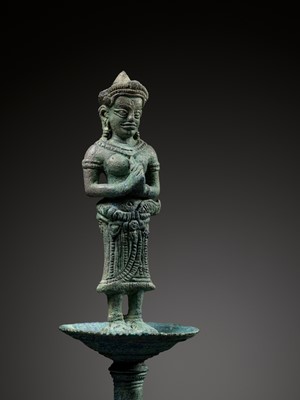 A KHMER BRONZE FITTING WITH A FIGURE OF A FEMALE DEITY, ANGKOR PERIOD