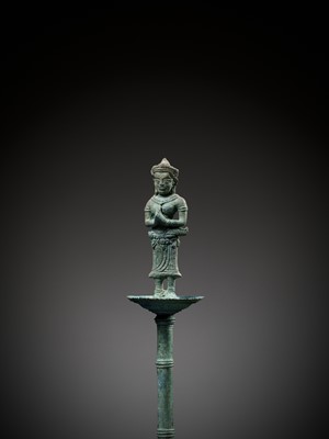 Lot 279 - A KHMER BRONZE FITTING WITH A FIGURE OF A FEMALE DEITY, ANGKOR PERIOD