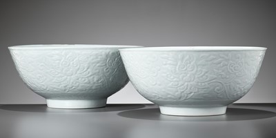 Lot 403 - A PAIR OF LARGE CARVED PALE CELADON GLAZED ‘LOTUS’ BOWLS, EARLY QING DYNASTY