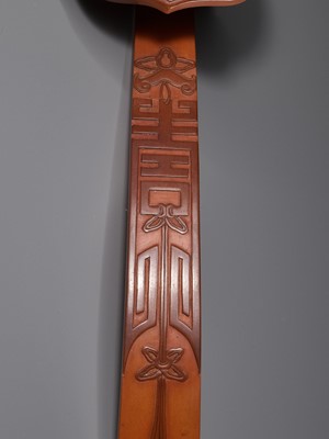 Lot 4 - AN EXTREMELY RARE AND FINE BAMBOO-VENEER RUYI SCEPTRE, QIANLONG PERIOD, IMPERIALLY INSCRIBED WITH A POEM COMPOSED IN THE BINGZI YEAR (1756)