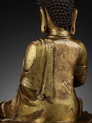 Lot 161 - AN EXCEPTIONALLY RARE AND SIGNED GILT BRONZE FIGURE OF BUDDHA, EARLY MING DYNASTY