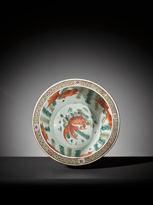 Lot 114 - A LARGE FAMILLE ROSE RELIEF-MOLDED FISHBOWL, QING DYNASTY