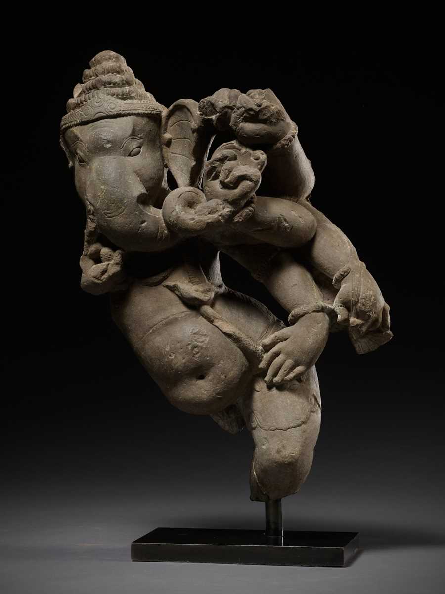 Lot 247 - A SANDSTONE FIGURE OF DANCING GANESHA,