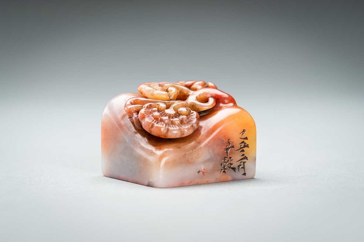 Lot 66 - A CARVED SOAPSTONE SEAL WITH LINGZHI, 1865