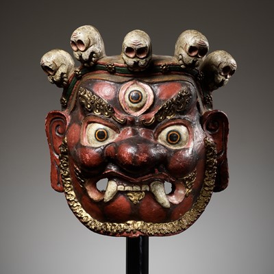 Lot 526 - A POLYCHROME AND GILT-LACQUERED PAPIER-MÂCHÉ RITUAL MASK FOR THE CHAM DANCE