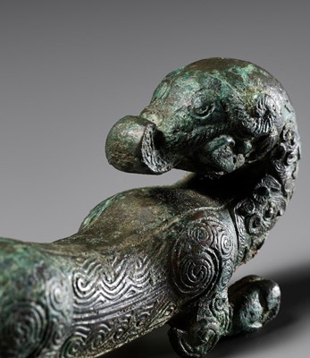 A SUPERB BRONZE FIGURE OF A DRAGON, EASTERN ZHOU DYNASTY, CHINA, 770-256 BC