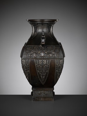 Lot 151 - A GOLD AND SILVER-INLAID BRONZE HU-FORM ARCHAISTIC VASE, 18TH CENTURY