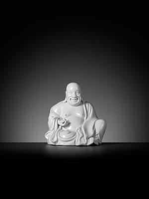 Lot 404 - A RARE WHITE GLAZED FIGURE OF A SEATED BUDAI, DEHUA, SIGNED XU YOUYI (CHINA 1887-1940)