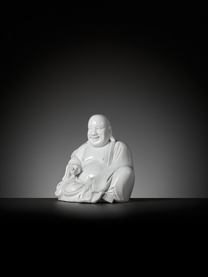 Lot 404 - A RARE WHITE GLAZED FIGURE OF A SEATED BUDAI, DEHUA, SIGNED XU YOUYI (CHINA 1887-1940)