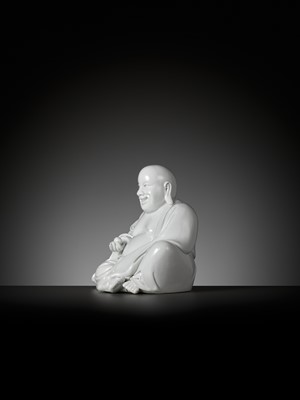 Lot 404 - A RARE WHITE GLAZED FIGURE OF A SEATED BUDAI, DEHUA, SIGNED XU YOUYI (CHINA 1887-1940)