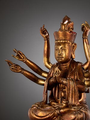 Lot 617 - A LARGE GILT-LACQUERED WOOD FIGURE OF AVALOKITESHVARA, VIETNAM, 18TH-19TH CENTURY