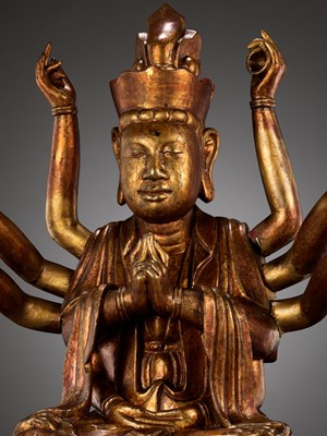 Lot 617 - A LARGE GILT-LACQUERED WOOD FIGURE OF AVALOKITESHVARA, VIETNAM, 18TH-19TH CENTURY