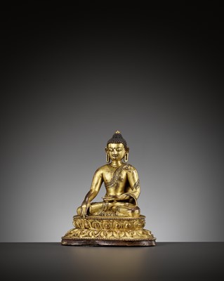 Lot 516 - A BRONZE FIGURE OF BUDDHA SHAKYAMUNI, TIBET, 15TH CENTURY
