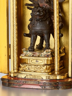 Lot 48 - A GILT AND LACQUERED WOOD ZUSHI (PORTABLE SHRINE) CONTAINING A LACQUERED WOOD FIGURE OF TOBATSU BISHAMONTEN