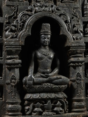 Lot 241 - A MAGNIFICENT BLACK STONE STELE DEPICTING AN ENSHRINED VAIROCANA, PALA PERIOD, NORTHEASTERN INDIA, 11TH-12TH CENTURY