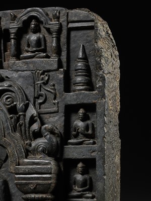 Lot 241 - A MAGNIFICENT BLACK STONE STELE DEPICTING AN ENSHRINED VAIROCANA, PALA PERIOD, NORTHEASTERN INDIA, 11TH-12TH CENTURY