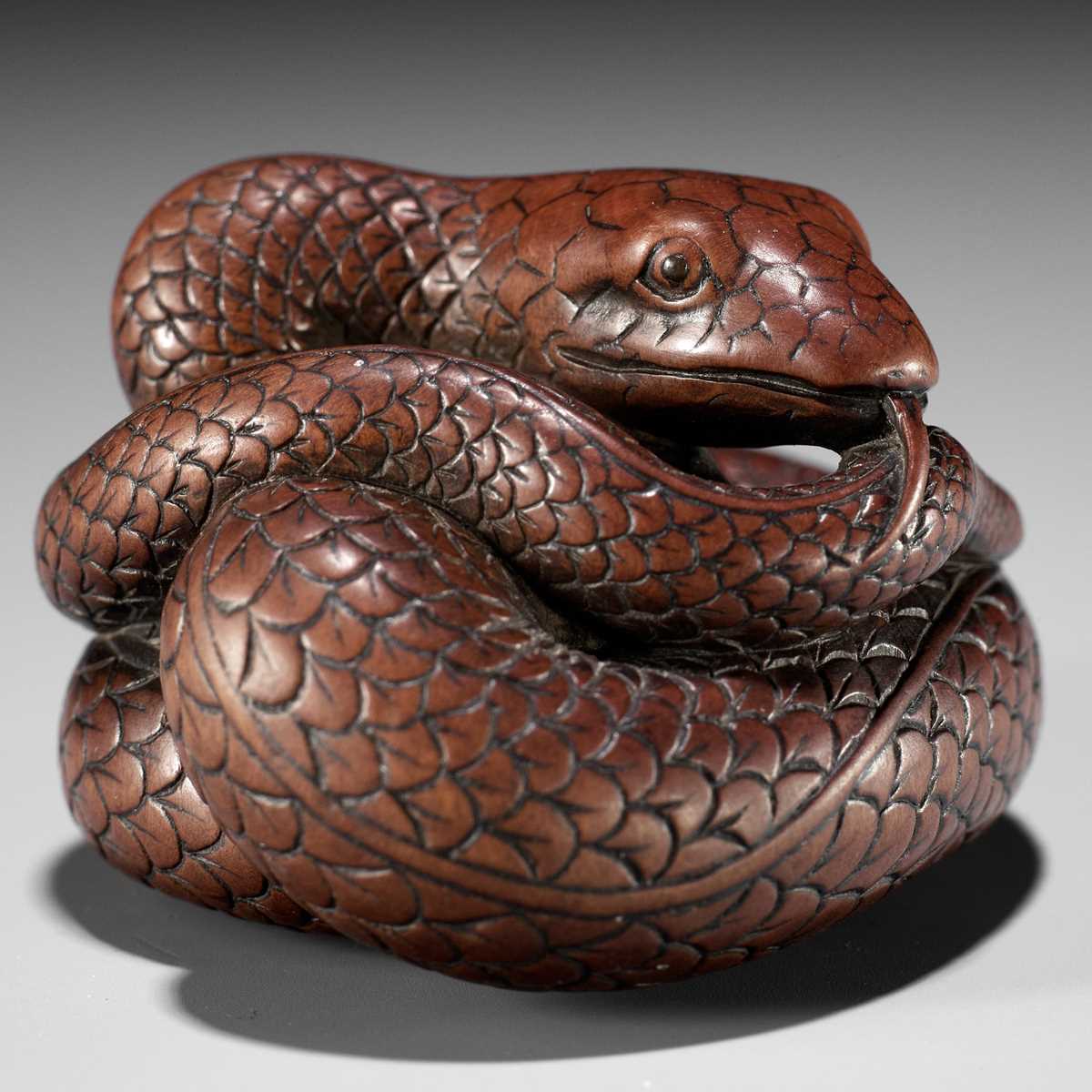 Netsuke Definition Lot 36 - AN EXCEPTIONAL AND LARGE WOOD NETSUKE OF A