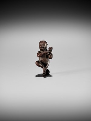 AN EXQUISITELY SMALL WOOD NETSUKE OF A FOX DANCER, ATTRIBUTED TO JUGYOKU