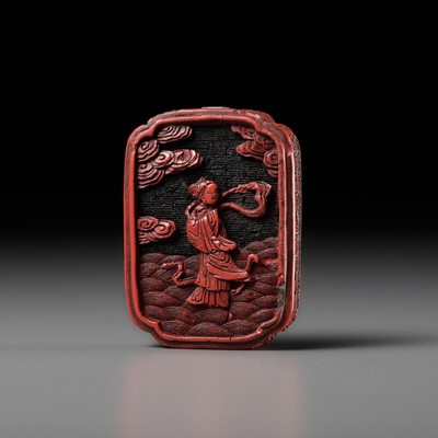 Lot 296 - A RARE TWO-COLOR CINNABAR LACQUER YAOPEI HANGING ORNAMENT, QING DYNASTY