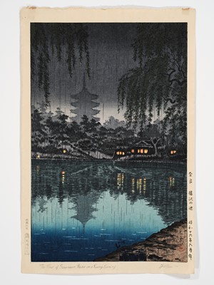 Lot 95 - TSUCHIYA KOITSU (1870-1949), THE POND OF SARUSAWA, NARA ON A RAINY EVENING