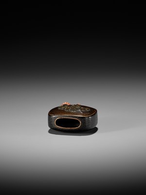 A RARE AND UNUSUAL LACQUER NETSUKE WITH FLORAL DESIGN