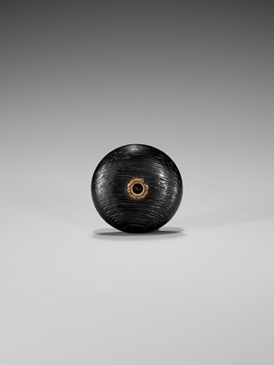 A DARK WOOD KAGAMIBUTA NETSUKE WITH A SHAKUDO PLATE DEPICTING SPARROWS IN BAMBOO