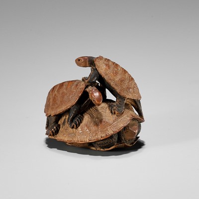 Lot 665 - SHOKIN: A WOOD NETSUKE OF THREE TURTLES IN A PYRAMID