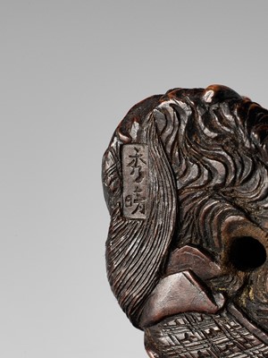 Lot 371 - HIDEHARU: A NAGOYA SCHOOL WOOD NETSUKE OF A DRUNKEN SHOJO WITH LADLE AND SAKE SAUCER