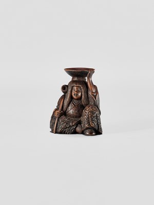 Lot 371 - HIDEHARU: A NAGOYA SCHOOL WOOD NETSUKE OF A DRUNKEN SHOJO WITH LADLE AND SAKE SAUCER