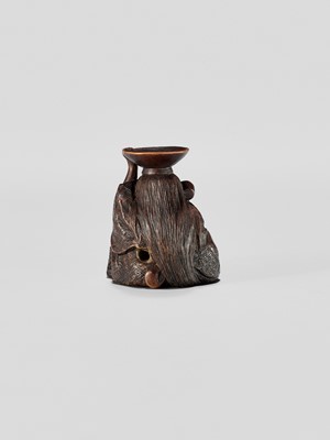 Lot 371 - HIDEHARU: A NAGOYA SCHOOL WOOD NETSUKE OF A DRUNKEN SHOJO WITH LADLE AND SAKE SAUCER