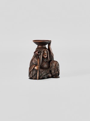 Lot 371 - HIDEHARU: A NAGOYA SCHOOL WOOD NETSUKE OF A DRUNKEN SHOJO WITH LADLE AND SAKE SAUCER