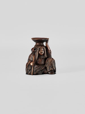 Lot 371 - HIDEHARU: A NAGOYA SCHOOL WOOD NETSUKE OF A DRUNKEN SHOJO WITH LADLE AND SAKE SAUCER