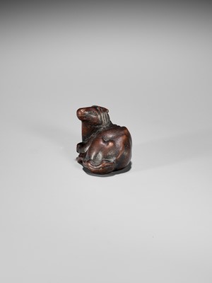 Lot 324 - MASAMARU: A FINE WOOD NETSUKE OF A RECUMBENT HORSE