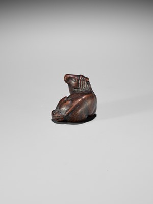 Lot 324 - MASAMARU: A FINE WOOD NETSUKE OF A RECUMBENT HORSE