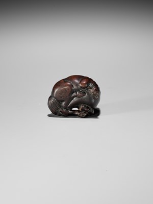 Lot 324 - MASAMARU: A FINE WOOD NETSUKE OF A RECUMBENT HORSE