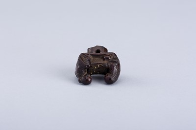 Lot 380 - INTERIOR OF A WOOD KARAKURI NETSUKE WITH TWO IMMORTALS PLAYING SUGOROKU, EDO PERIOD