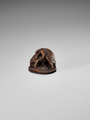 Lot 342 - SEIGYOKU: A WOOD NETSUKE OF THREE TURTLES IN A PYRAMID