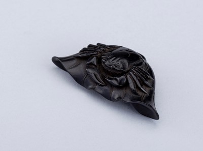 Lot 887 - JUGYOKU: AN INLAID EBONY WOOD NETSUKE OF A CRAB ON A LOTUS LEAF